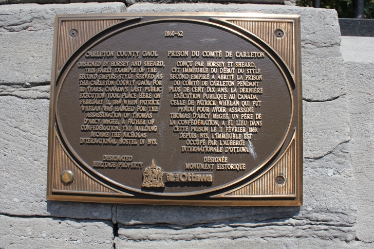 Plate at the entrance of the Jail Hostel