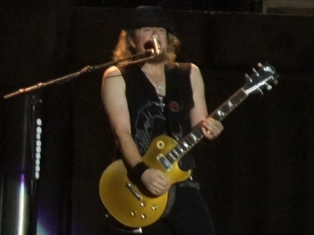 Adrian Smith wearing a hat in Valencia