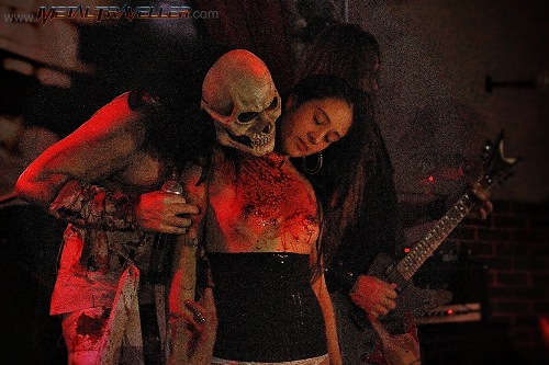 semi naked girl on stage with Lizzy Borden