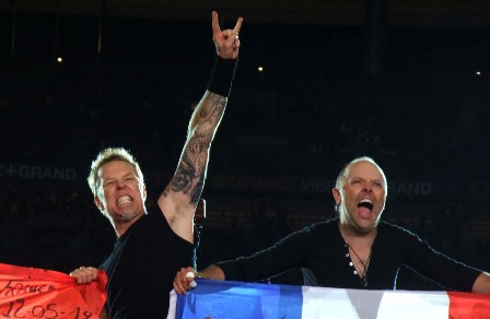 Lars and James from MMetallica holding the flag of France