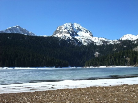 Savin Kuk and Međed peaks from the shore of the frozen Black Lake, Durmitor National Park, Montenegro