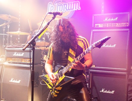 Oz Fox on guitars playing with Stryper in France