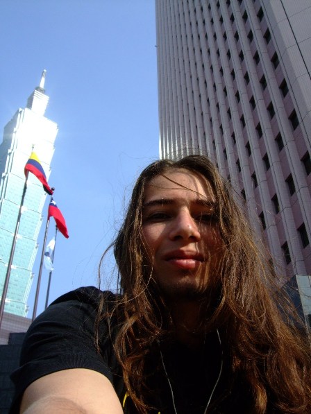 Metal Traveller with the Colombian Flag at the Taipei 101 Building, Taiwan